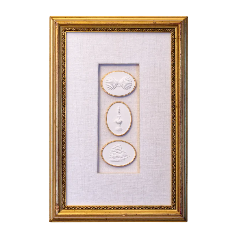 Custom framed intaglio trio in a gold frame