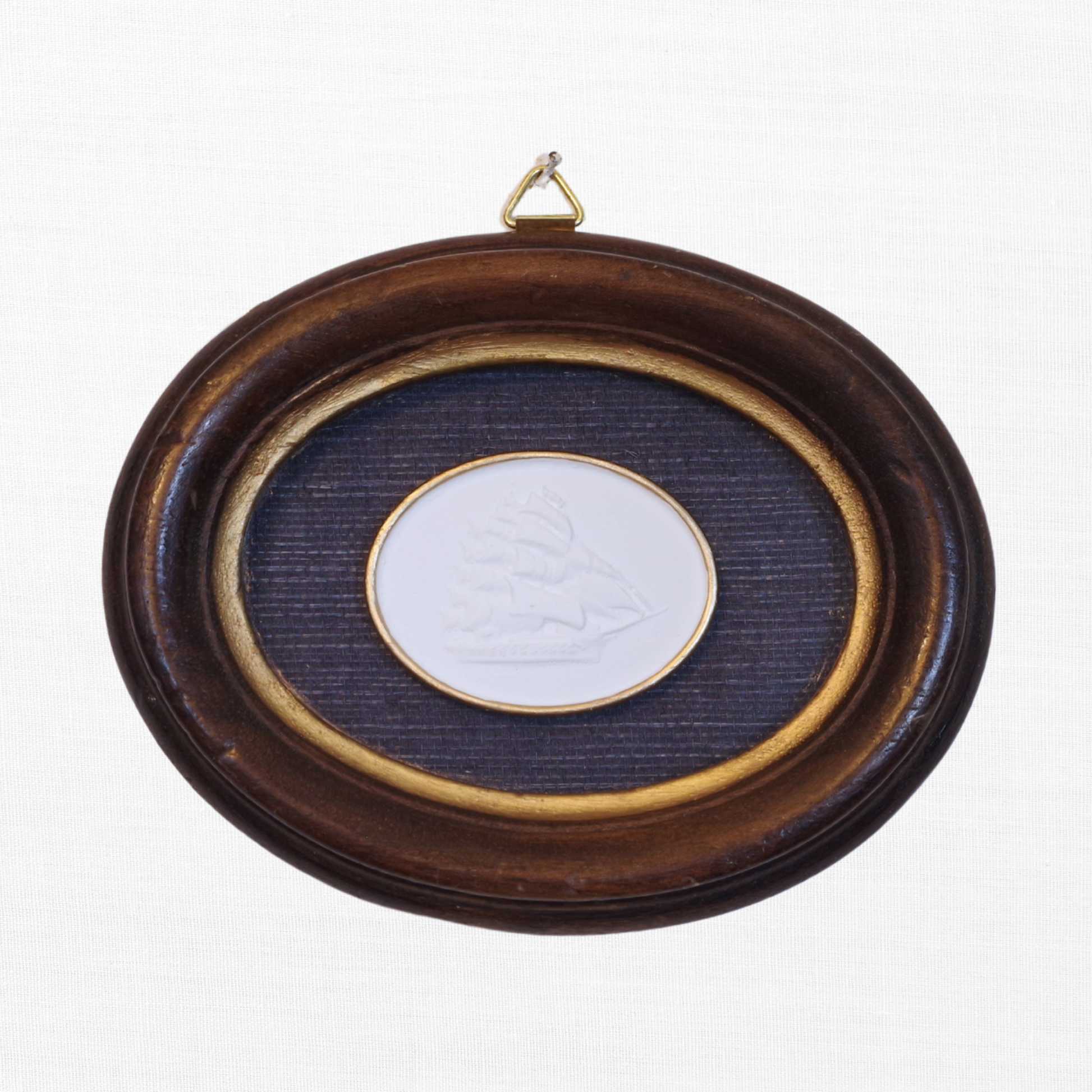 Tall Ship · Vintage Oval Walnut Frame · Navy Wallpaper