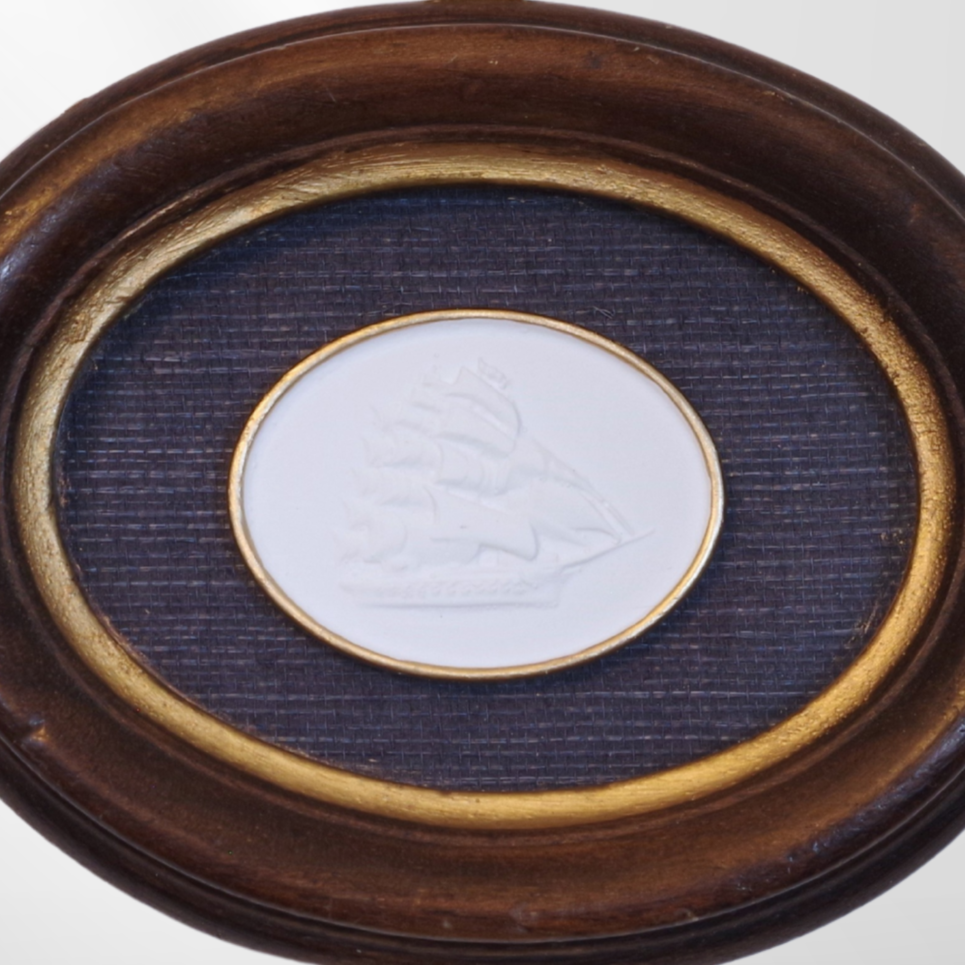 Tall Ship · Vintage Oval Walnut Frame · Navy Wallpaper